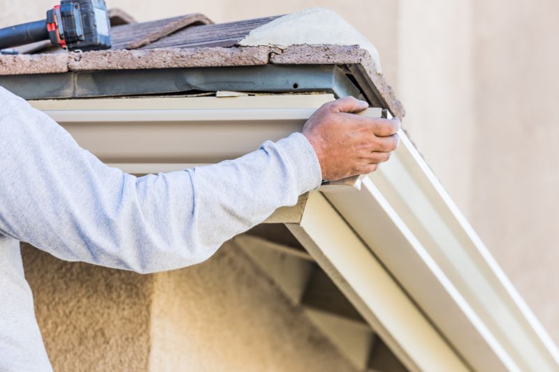 Professional Installing Gutter Covers